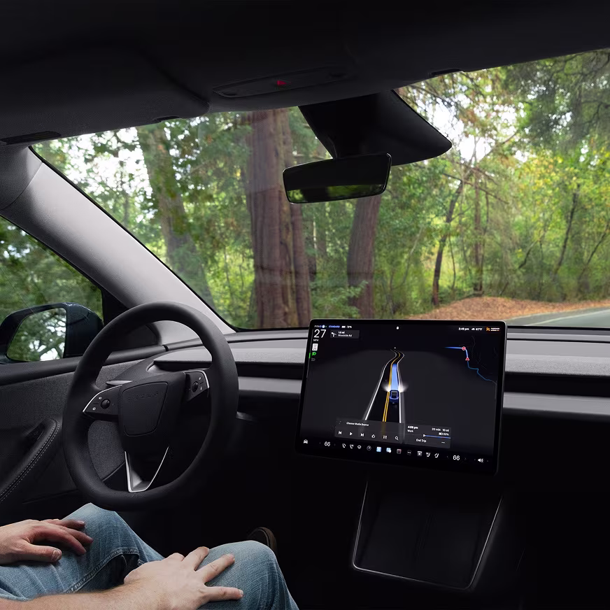Model Y and Cybertruck parked