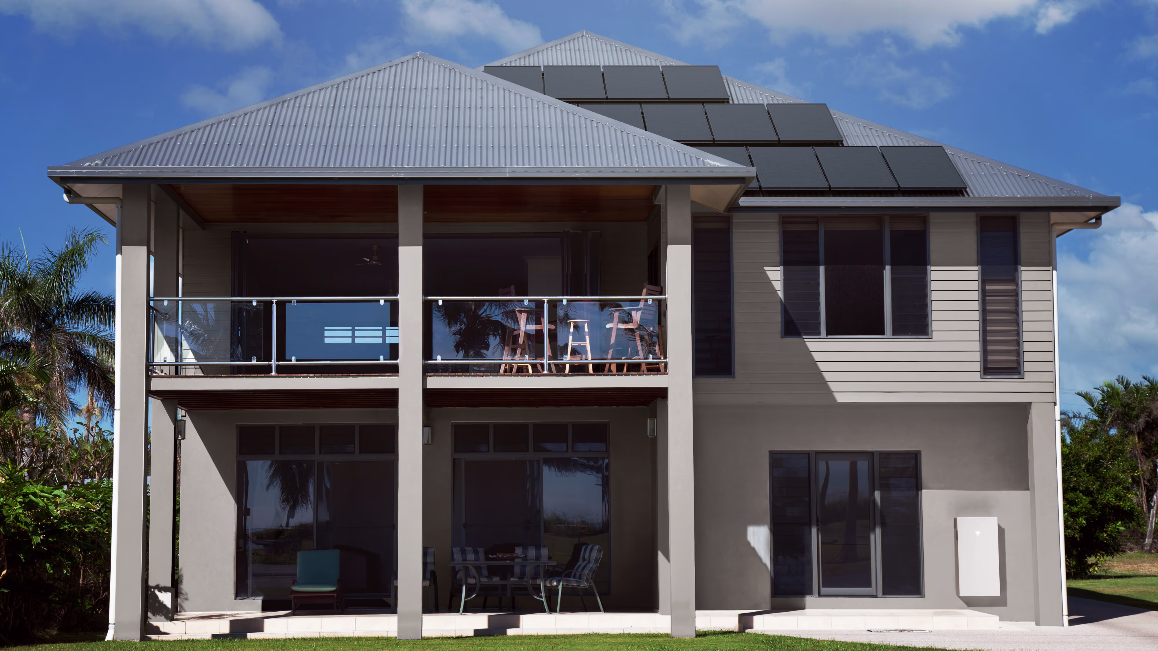 A modern home with Solar Panels and Powerwall