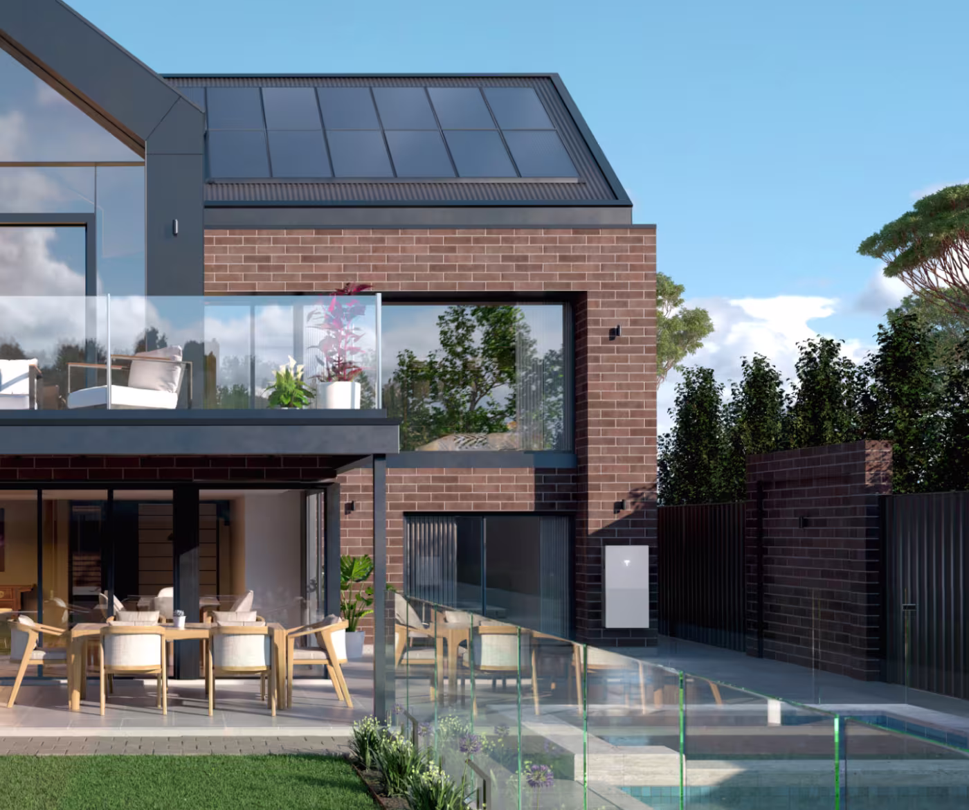 View of a home with solar and Powerwall installed and a backyard covered in snow