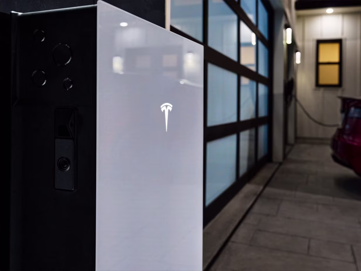 Close up view of Powerwall 3 installed outside a home
